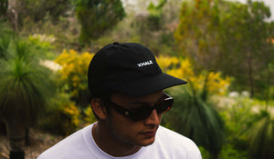 Xhale Black Wordmark Cap on Model